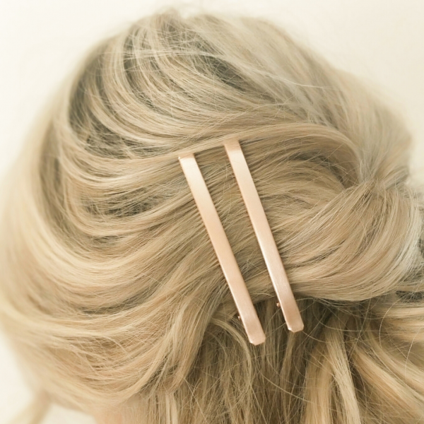 brushed metal hair clips in hair