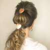 rose gold hair ties in double ponytail hairstyle