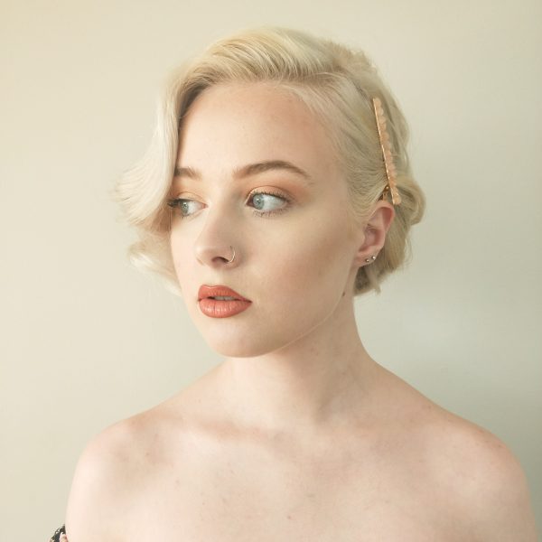 vintage waved hairstyle with crystal clip on side