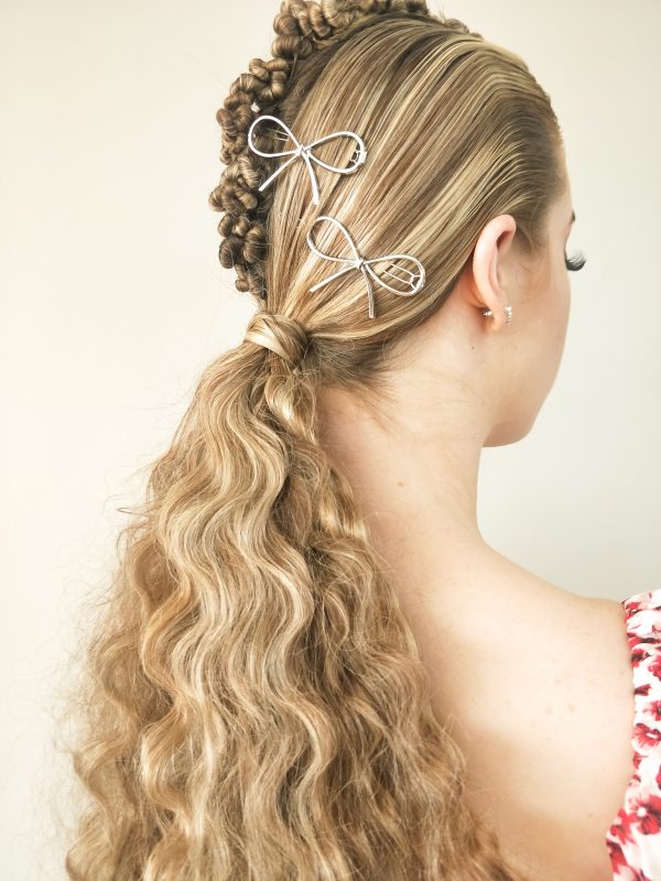 textured modern hairstyle with silver metal bow hair clipsme