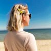 botanical daisy hair clip in blonde bob hairstyle
