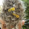 yellow hair clips in curly hair